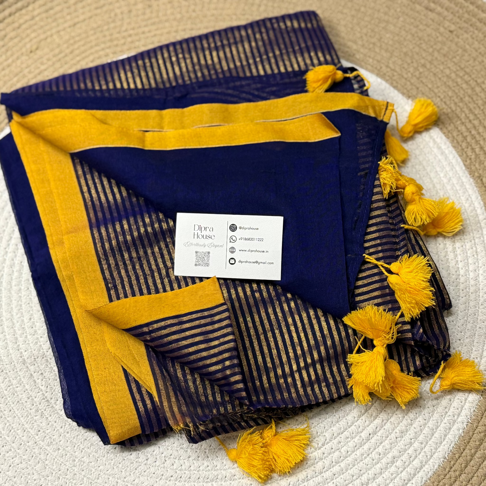 Blue colour mulmul saree with golden stripes